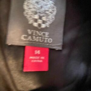 This dress is black and sparkly!  It’s a size 14! You can wear it to anything!